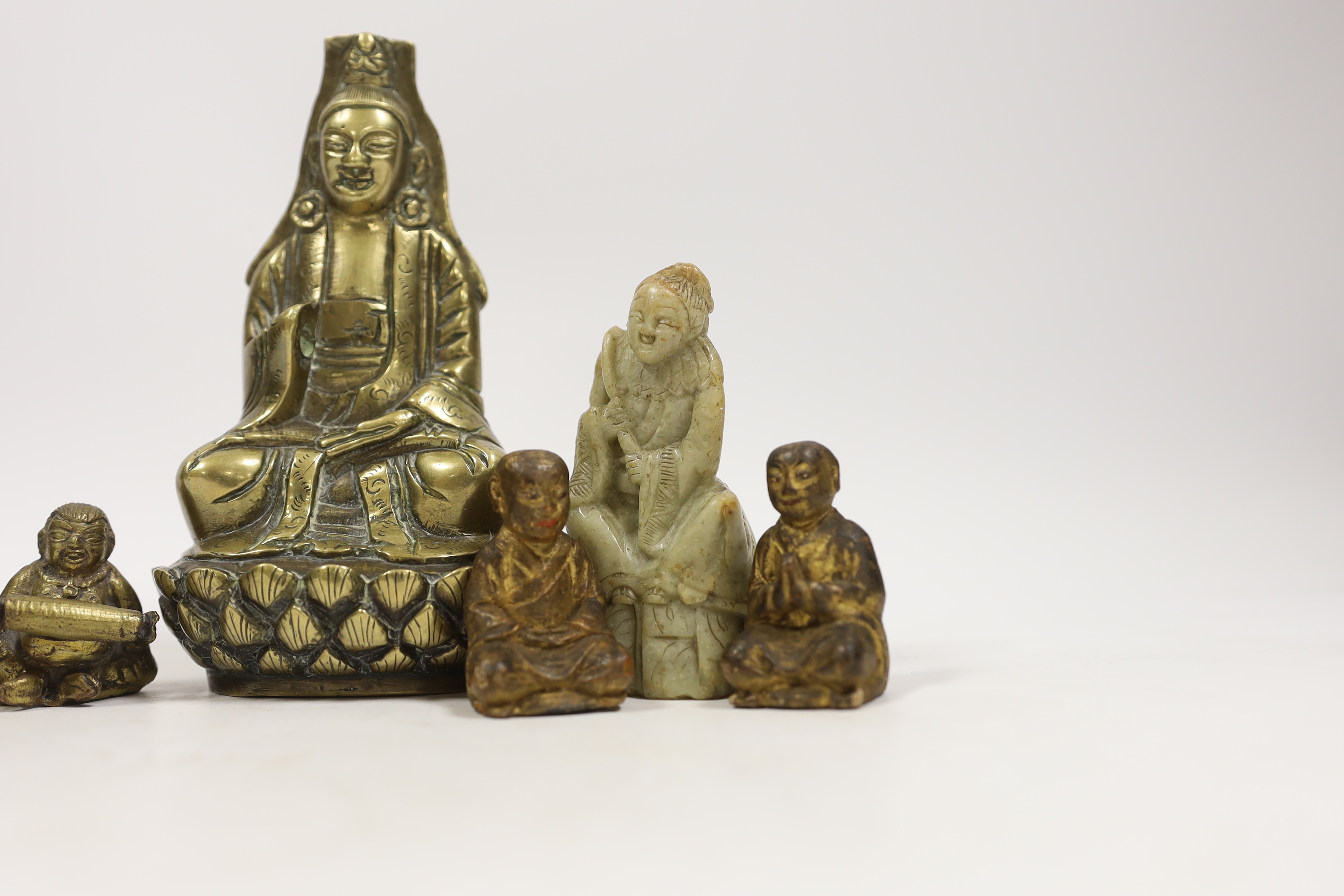 A Chinese bronze Buddha, a soapstone figure, etc, largest 15cm high